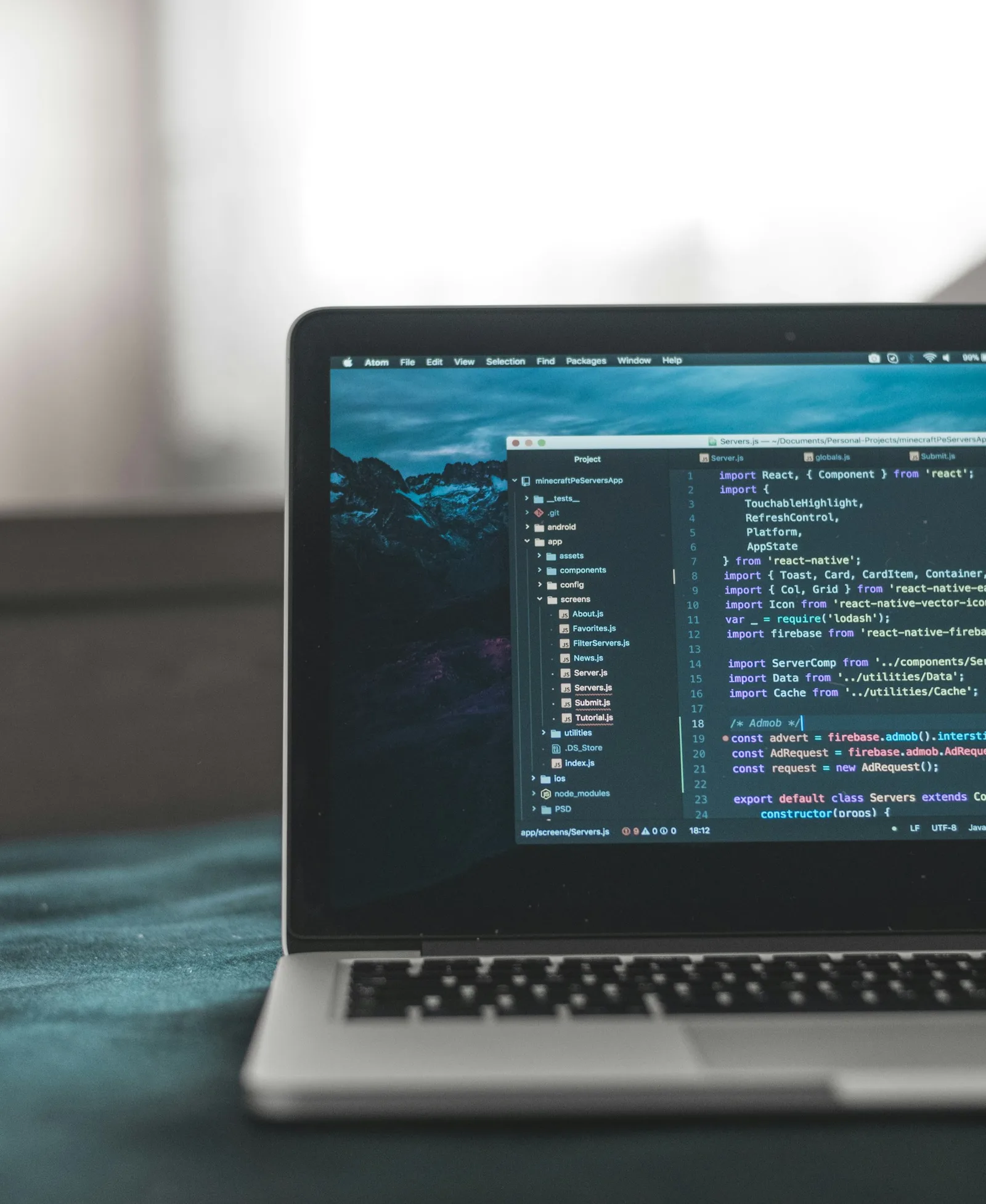 Laptop with a code editor on screen